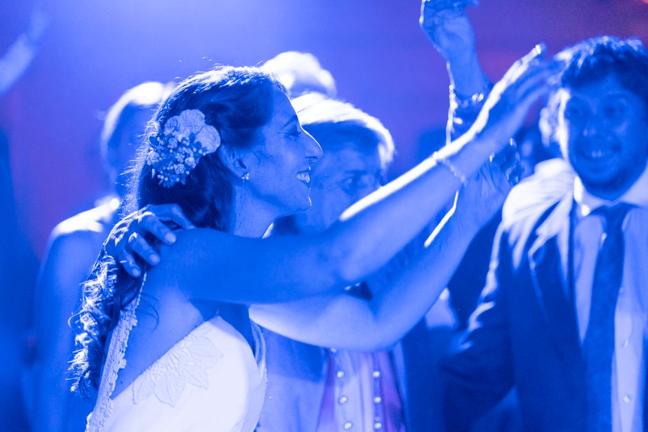 Lively event videography capturing guests dancing at a reception